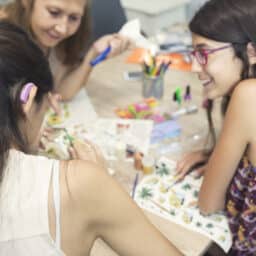 Woman with hearing loss participates in activity with friends